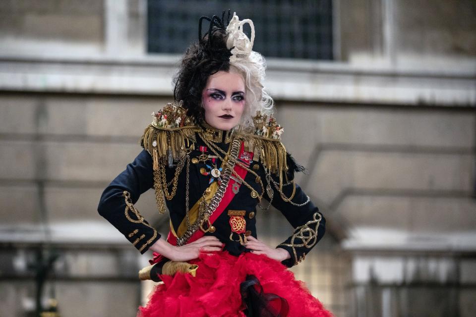 Stone as Cruella in an elaborate costume