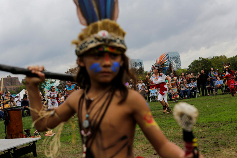 <p>Revellers perform during a “pow-wow” celebrating the Indigenous Peoples’ Day Festival in Randalls Island, in New York, Oct. 8, 2017. The festival is held as a counter-celebration to Columbus Day and to promote Native American culture and history. (Photo: Eduardo Munoz/Reuters) </p>