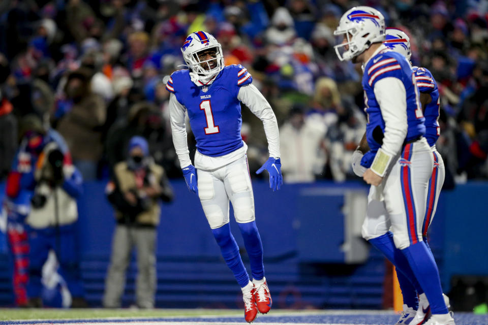 Buffalo Bills wide receiver Emmanuel Sanders (1) celebrates his touchdown catch with quarterback Josh Allen (17) during the second half of an NFL wild-card playoff football game, Saturday, Jan. 15, 2022, in Orchard Park, N.Y. (AP Photo/Joshua Bessex)