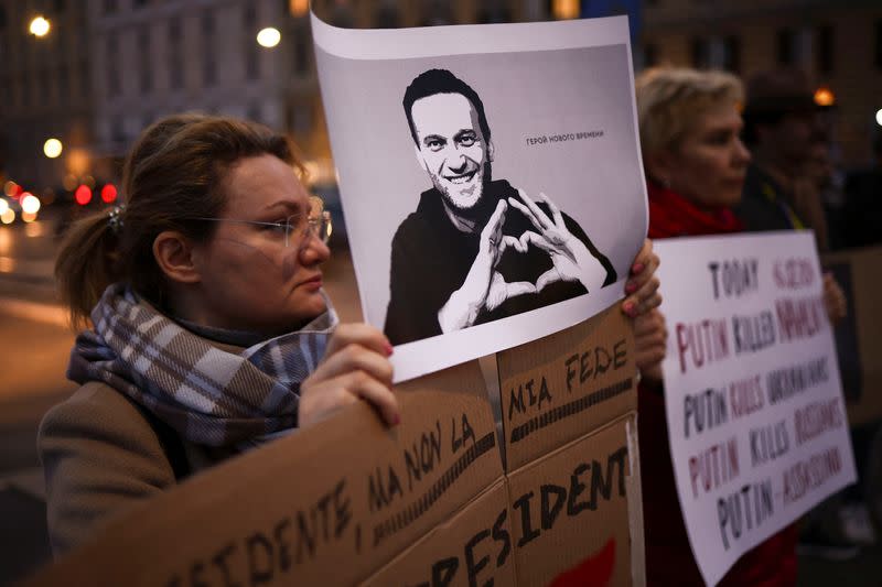 People gather after the death of Russian opposition leader Alexei Navalny, in Italy