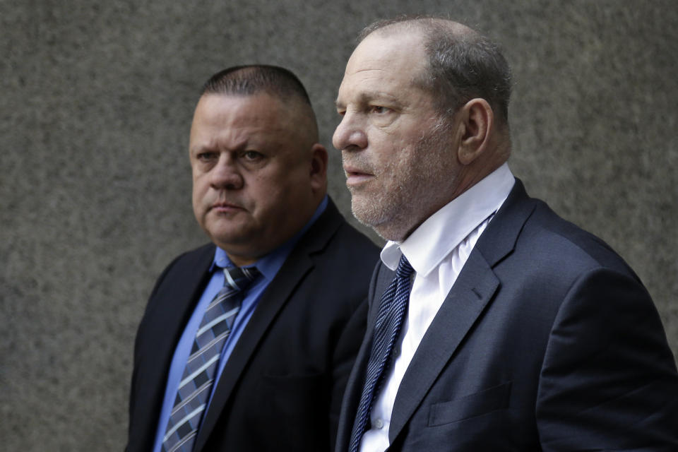 Former movie mogul Harvey Weinstein, right, leaves State Supreme Court following a hearing related to his sexual assault case, Thursday, July 11, 2019, in New York. Weinstein's lawyer Jose Baez went to court Thursday to get a judge's permission to leave the case, the latest defection from what was once seen as a modern version of O.J. Simpson's "dream team" of attorneys. (AP Photo/Seth Wenig)