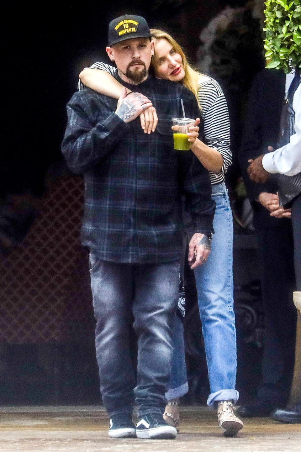 <p>If you were wondering where Diaz has been lately, she’s been living in marital bliss. From the looks of it, the <i>There’s Something About Mary</i> star was in love as ever with her hubby of two years, rocker Benji Madden, as they dined out in Beverly Hills. (Photo: BACKGRID) </p>