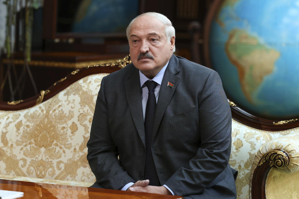 In this handout photo released by Russian Foreign Ministry Press Service, Belarusian President Alexander Lukashenko listens to Russian Foreign Minister Sergey Lavrov during their meeting in Minsk, Belarus, Thursday, Jan. 19, 2023. After Russia invaded Ukraine, guerrillas from Belarus began carrying out acts of sabotage on their country's railways, including blowing up track equipment to paralyse the rails that Russian forces used to get troops and weapons into Ukraine. (Russian Foreign Ministry Press Service via AP)