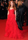 Cannes Film Festival 2013: Isla Fisher wore a bright red Oscar de la Renta frock.