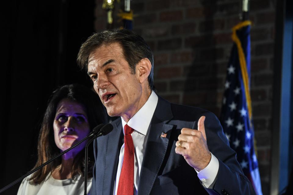 Republican U.S. Senate candidate Mehmet Oz greets supporters after the primary race resulted in an automatic re-count due to close results on May 17, 2022 in Newtown, Pennsylvania. Television personality Oz, endorsed by former President Donald Trump, finished in a virtual dead heat with former George W. Bush administration official Dave McCormick with 95 percent of the vote reported.