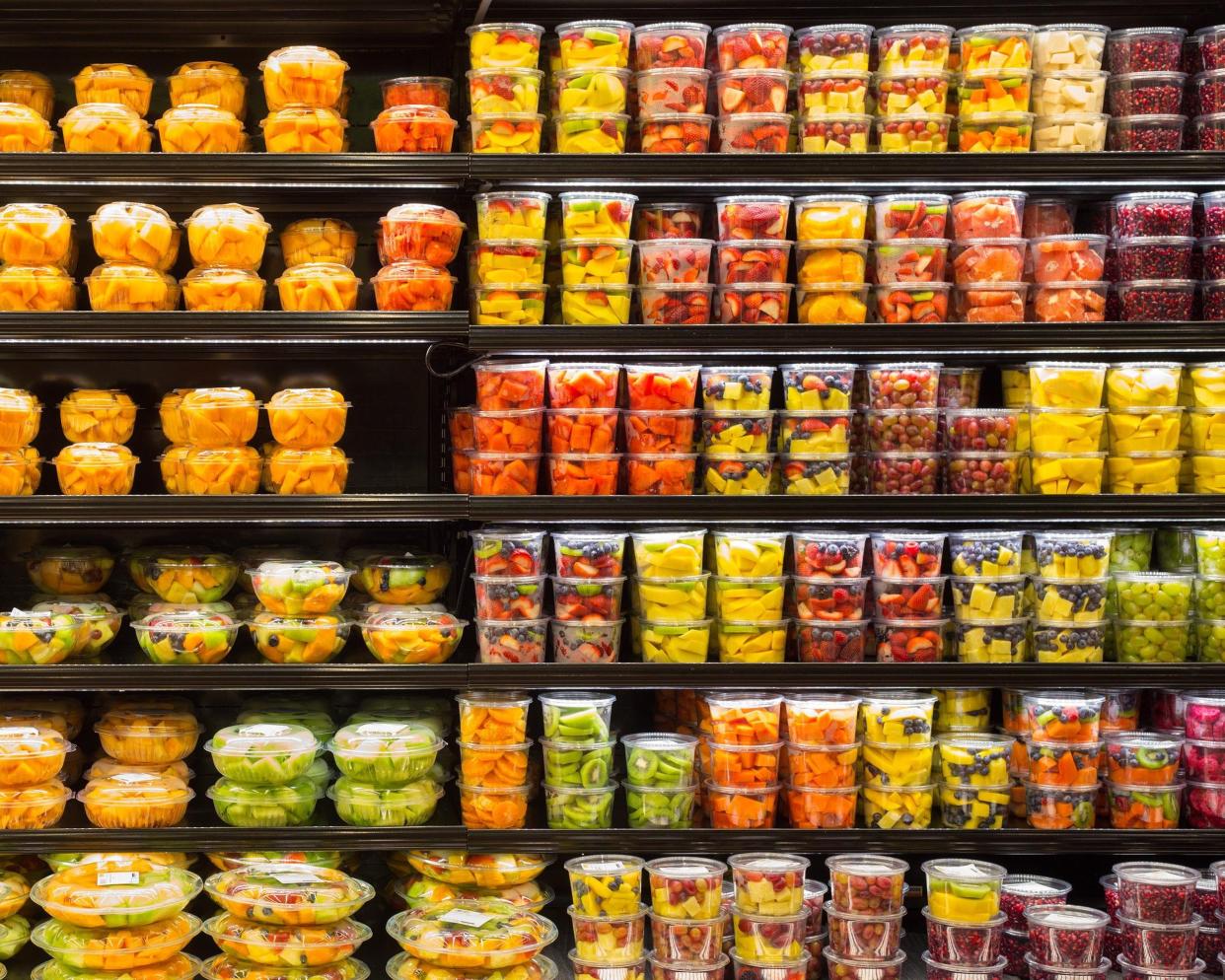 selection of pre-portioned produce at grocery store