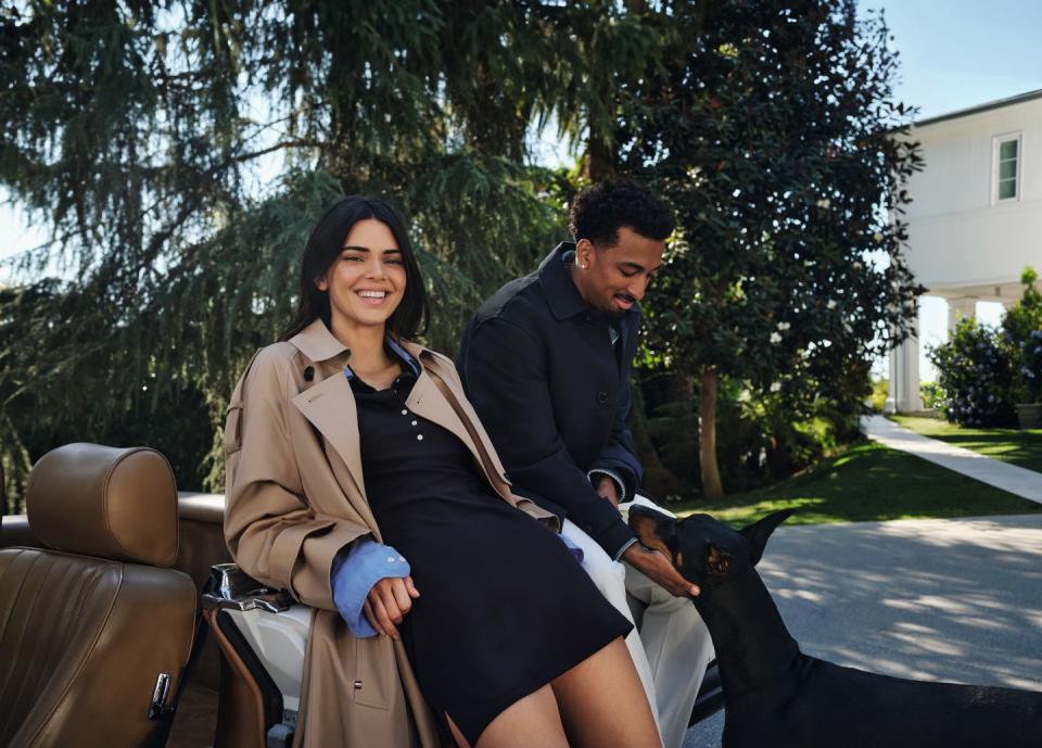 a man and woman sitting on a couch