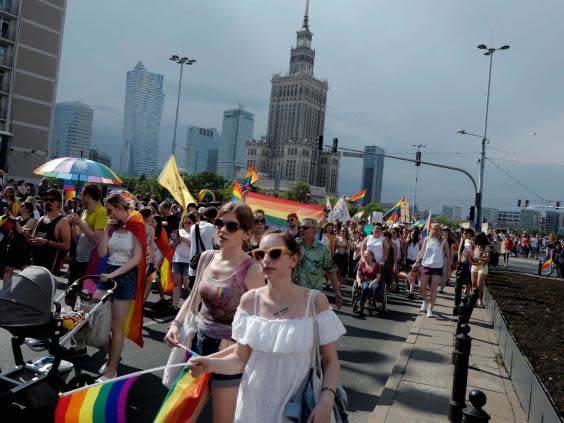 Participants take part at the 'Equality Parade' rally in support of the LGBT+ community in Warsaw (REUTERS)