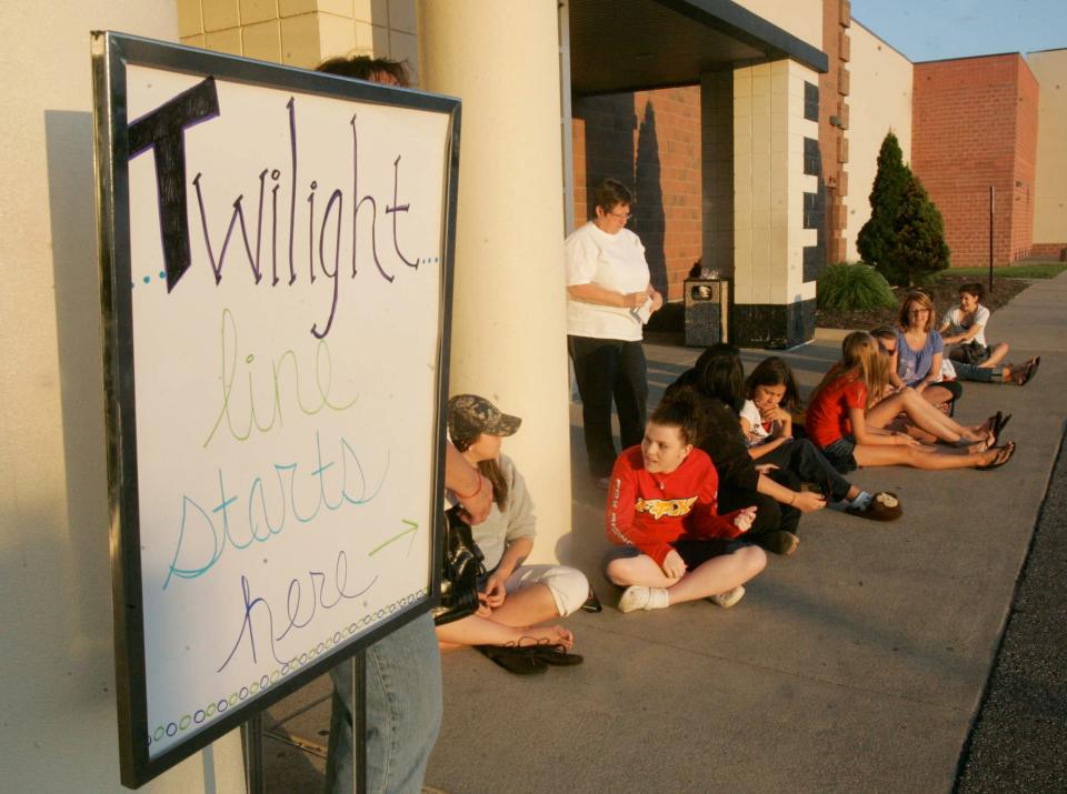 Twilight fans who have already purchased tickets wait in line for the 12:01am showing of "Eclipse" the third movie of the Twilight vampire saga at the Montrose Regal Cinema Tuesday, June 29, 2010 in Akron, Ohio.  (Karen Schiely/Akron Beacon Journal)