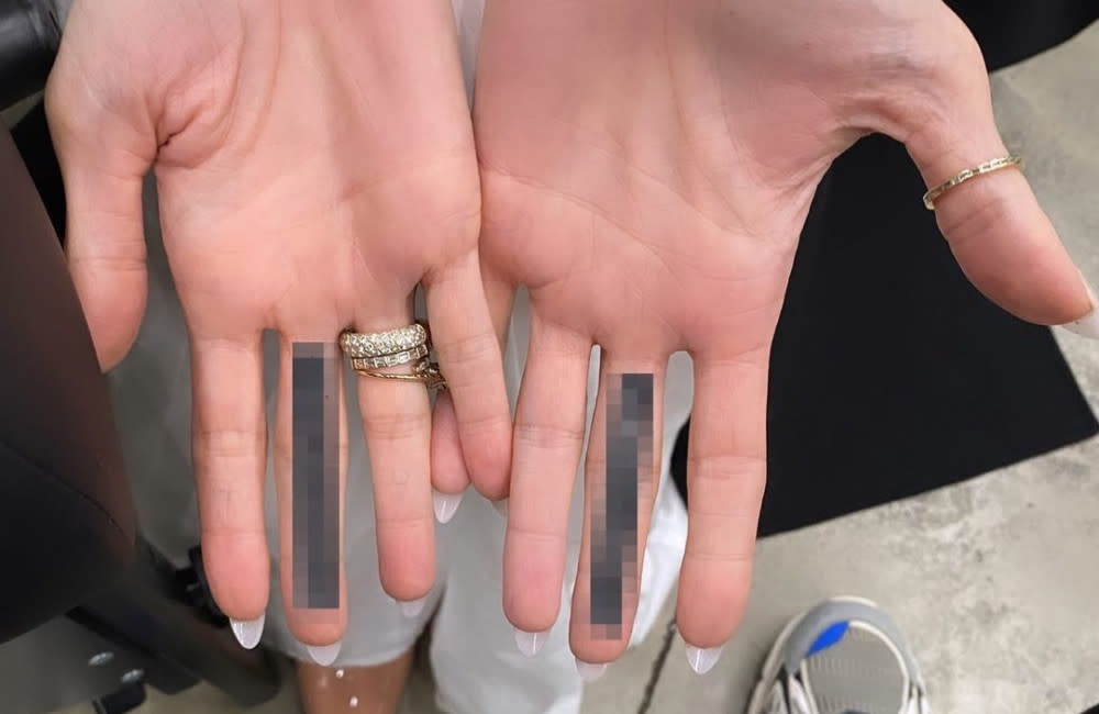 Angelina Jolie has had mystery tattoos on both her middle fingers – prompting fans to speculate it is a ‘f*** you’ to her ex Brad Pitt credit:Bang Showbiz