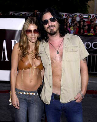 Gilby Clarke and gal Daniella at the Westwood premiere of Warner Brothers' Rock Star