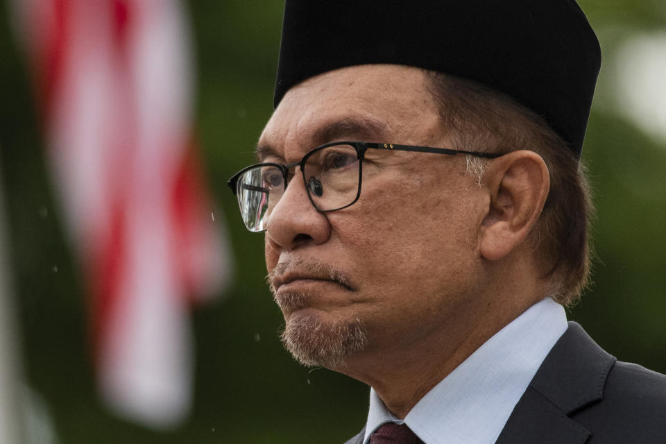 Malaysian Prime Minister Anwar Ibrahim attends a wreath-laying ceremony at Rizal Park in Manila, Philippines Thursday, March 2, 2023. (Lisa Marie David/Pool Photo via AP)