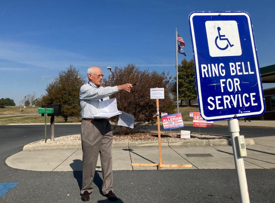 Victor Ludlum is a member of the Augusta County Electoral Board. On Tuesday, he was checking the number of handicap parking spots at Wilson Elementary, one of his many duties on Election Day.