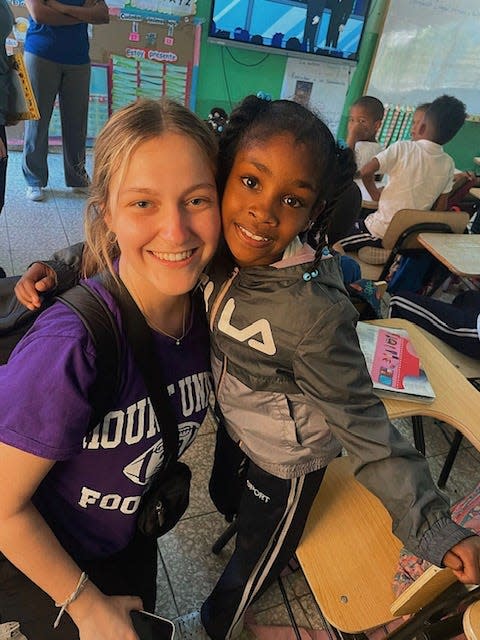 Mount Union student Alexis Dupont connected well with youngsters well during her class trip to the Dominican Republic over spring break.