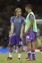 <p>Real Madrid’s Luka Modric and Casemiro warm up before the match </p>