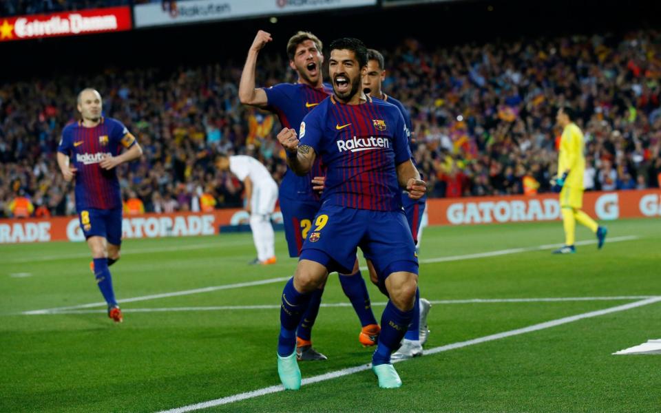 Luis Suarez celebrates giving Barcelona the lead - AP