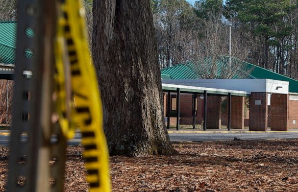 PHOTO: Police tape hangs from a sign post outside Richneck Elementary School, January 7, 2023, in Newport News, Va. (Jay Paul/Getty Images, FILE)