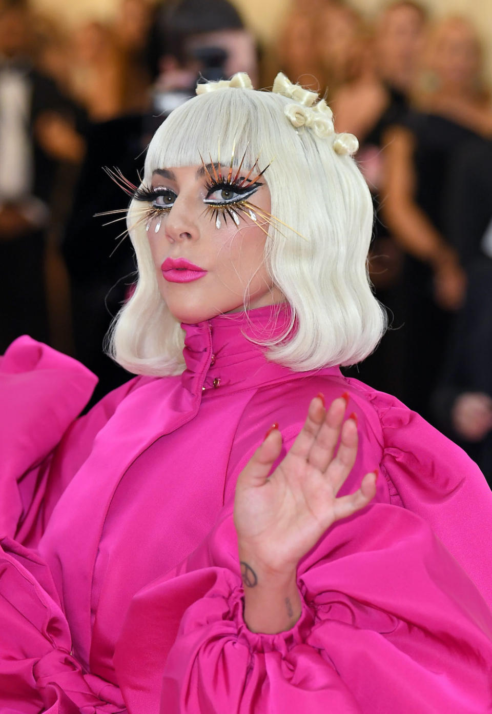 Lady Gaga's embellished lashes and hot pink lip