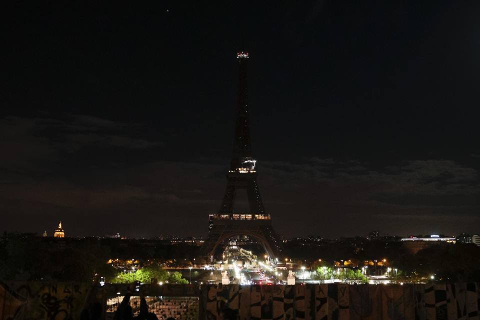 The lights of the Eiffel Tower are turned off in memory of Queen Elizabeth II, on September 8, 2022 in Paris, France. The city announced plans to turn the lights off overnight this fall and winter to save energy. / Credit: Geoffroy Van Der Hasselt/Anadolu Agency via Getty Images