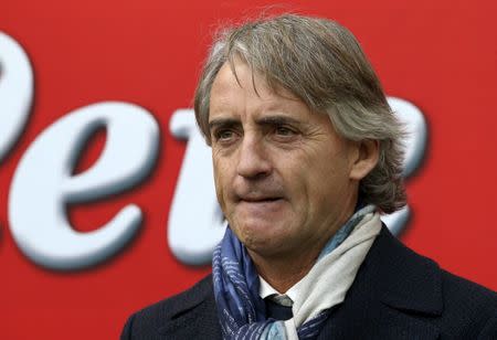 Inter Milan's coach Roberto Mancini looks on before the start of their Italian Serie A soccer match against Carpi at the San Siro stadium in Milan, Italy, January 24, 2016. REUTERS/Stefano Rellandini Picture Supplied by Action Images