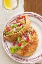 <p>If the thought of how much food you ate on Thanksgiving makes you ill, try this lightened-up sandwich the day after the big event.</p><p><strong>Get the recipe at <a href="https://www.countryliving.com/food-drinks/recipes/a4313/turkey-cobb-sandwiches-recipe-clx1113/" rel="nofollow noopener" target="_blank" data-ylk="slk:Country Living;elm:context_link;itc:0;sec:content-canvas" class="link ">Country Living</a>.</strong></p>