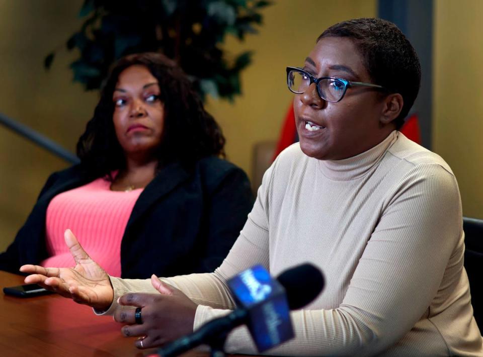 Adrienne Pollard, right, the widow of David Pollard, speaks during a Wednesday afternoon press conference in Columbus, Georgia about the 2016 death of her husband in a fatal car crash. 10/18/2023