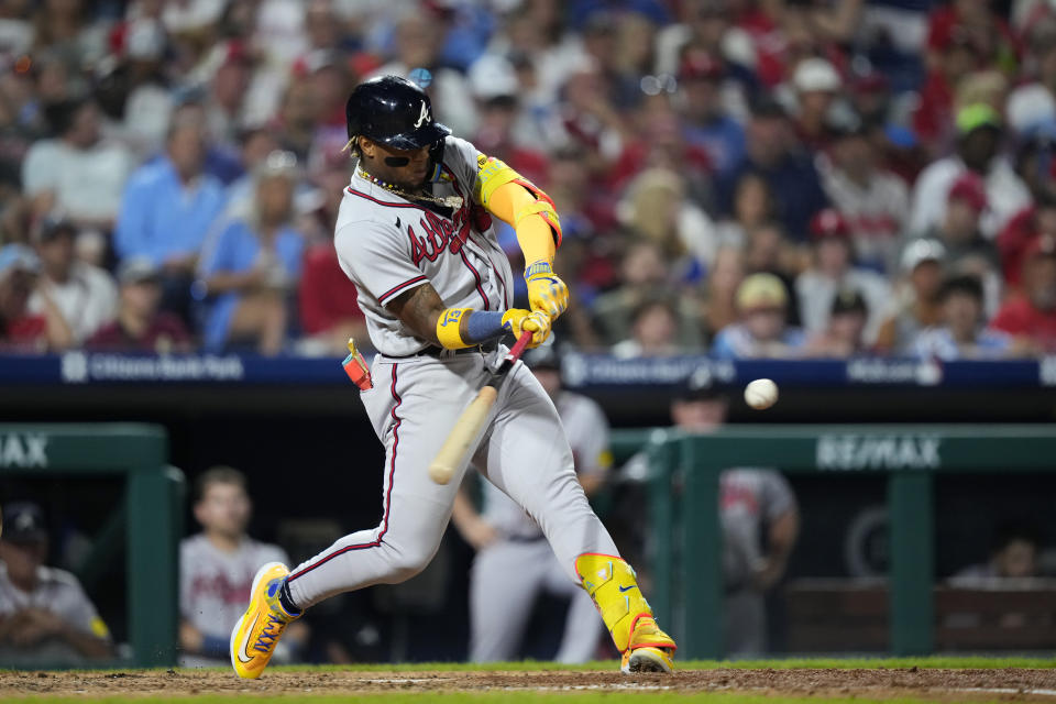 Atlanta Braves' Ronald Acuna Jr. hits a two-run home run against Philadelphia Phillies pitcher Zack Wheeler during the fifth inning of a baseball game, Tuesday, Sept. 12, 2023, in Philadelphia. (AP Photo/Matt Slocum)