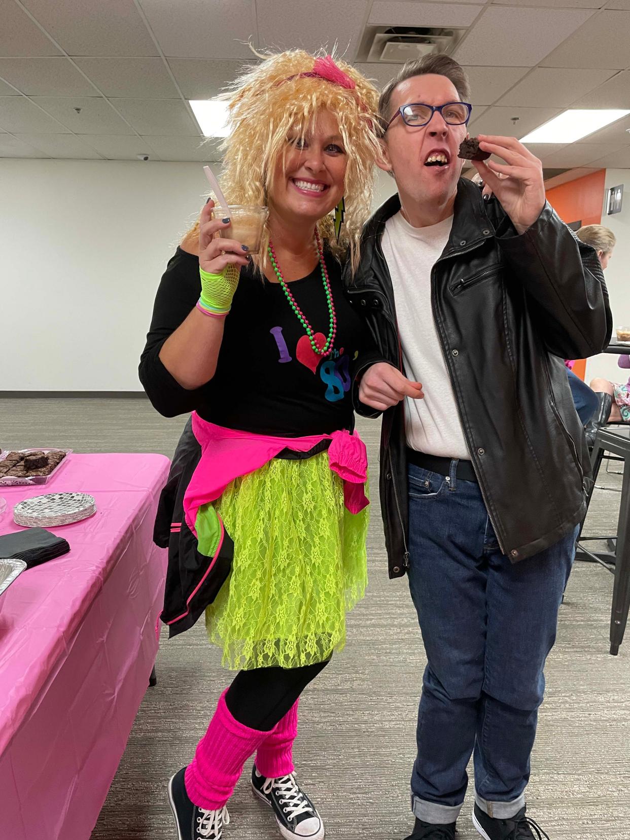 Dressed to impress and enjoying the snacks are Diane Knudsen (Helping Hands ministry at First Baptist Concord) with friend Josh Haddock at the Dancing Through the Decades event sponsored by Joni and Friends Nov. 11 at Fellowship Church on Middlebrook Pike.