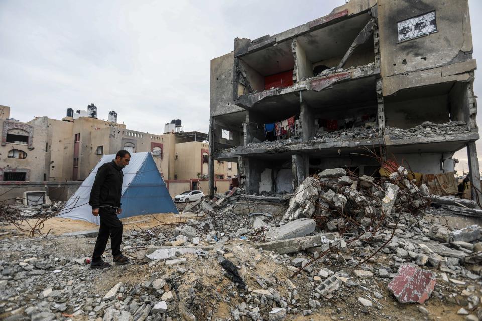 Palestinian Hamada Abu Salima, 59, lives in a tent by the ruins of his house that was destroyed by Israeli raids, which also killed 10 members of his family, on Jan. 28, 2024, in Rafah.