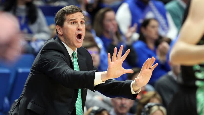 Utah Valley head coach Mark Madsen directs his team during the first half of an NCAA college basketball game against Kentucky in Lexington, Ky., Monday, Nov. 18, 2019. (AP Photo/James Crisp)