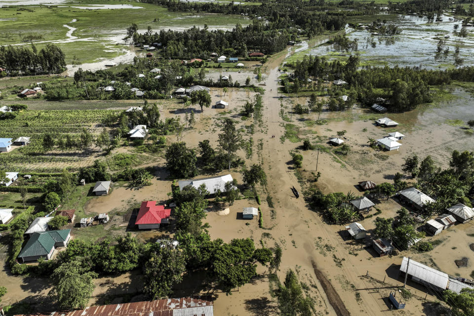 An aerial view shows a flooded area in Ombaka Village, Kisumu, Kenya Wednesday, April 17, 2024. Heavy rains pounding different parts of Kenya have led to the deaths of at least 13 people and displaced some 15,000, the United Nations said, as forecasters warned more rains can be expected until June. (AP Photo/Brian Ongoro)
