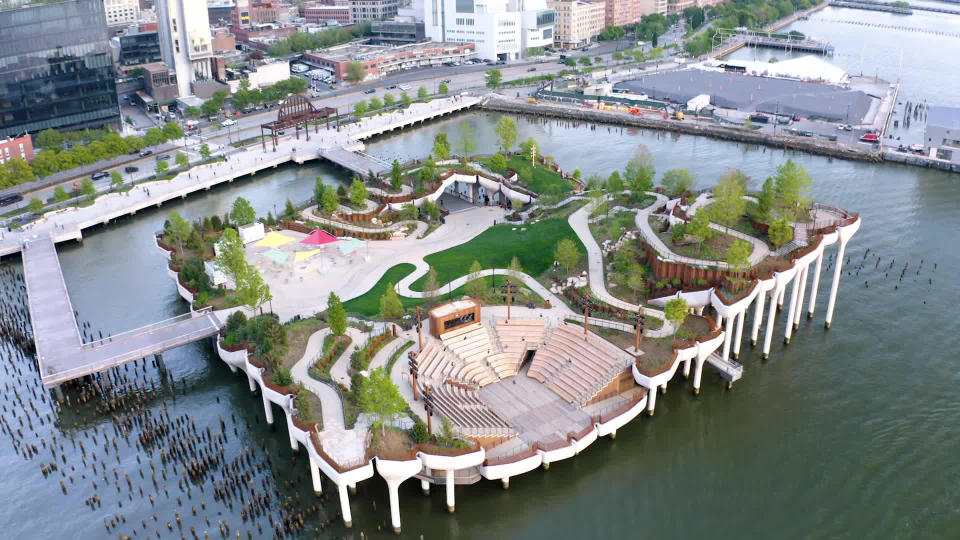 Replacing a derelict pier on the Hudson River, the $260 million Little Island is a new public space and performance venue constructed on top of concrete pilings shaped like tulips. / Credit: CBS News