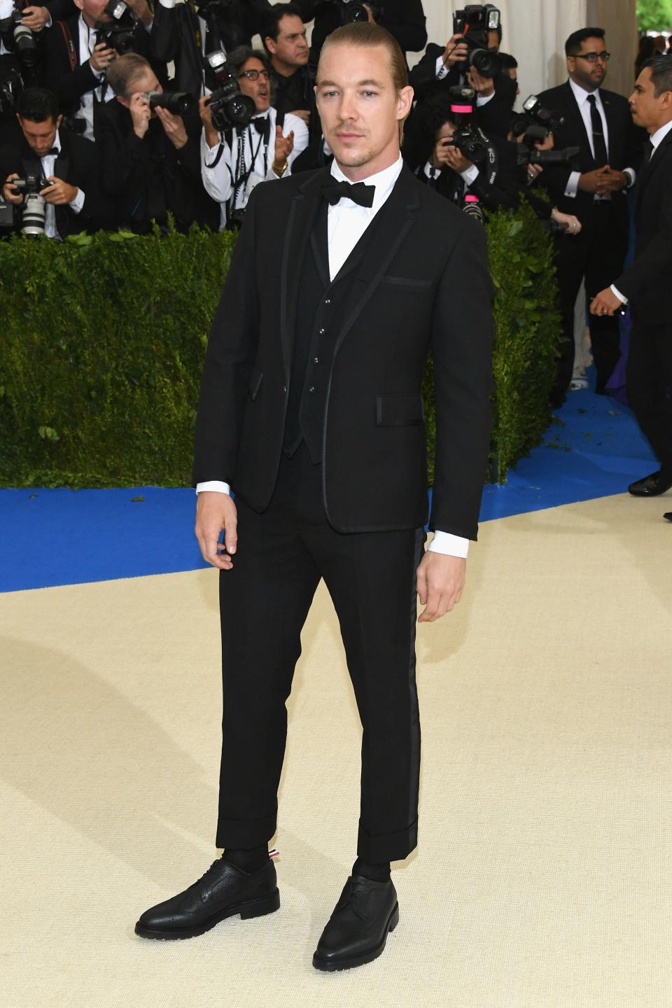 <h1 class="title">Diplo in Thom Browne</h1><cite class="credit">Photo: Getty Images</cite>