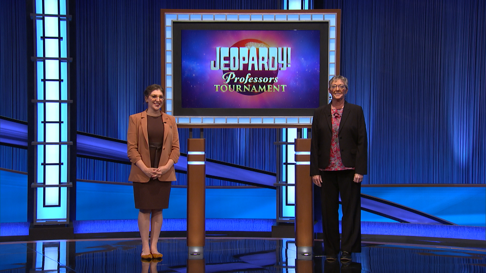 Julia Williams poses with host Mayim Bialik on the Jeopardy! set.