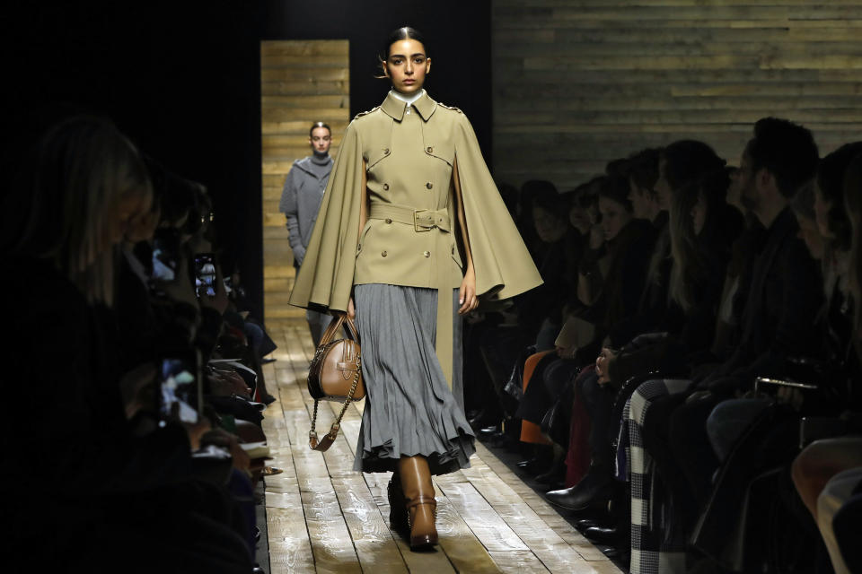 The Michael Kors collection is modeled during Fashion Week in New York, Wednesday, Feb. 12, 2020. (AP Photo/Richard Drew)