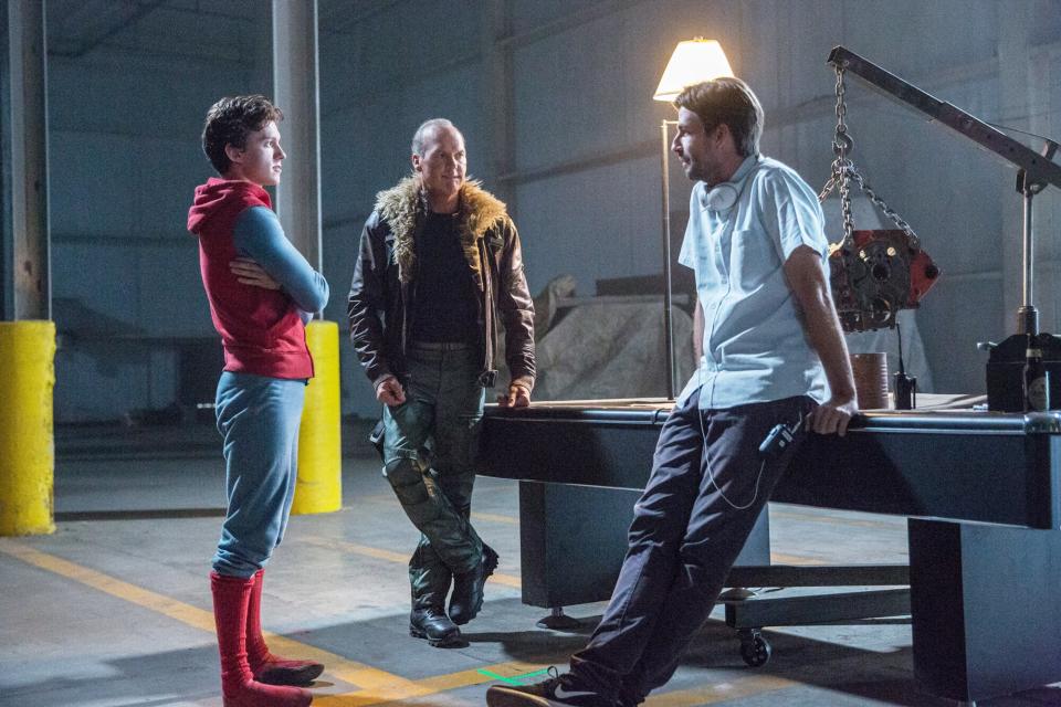 SPIDER-MAN: HOMECOMING, from left, Tom Holland, Michael Keaton, director Jon Watts, on-set, 2017.