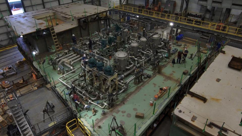 An Enterprise (CVN-80) unit undergoes construction inside a Newport News Shipbuilding facility. HII photo.