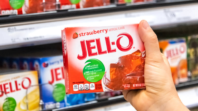 Box of Jell-O in hand