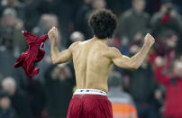 Liverpool's Mohamed Salah celebrates after scoring his side's second goal during the English Premier League soccer match between Liverpool and Manchester United at Anfield Stadium in Liverpool, Sunday, Jan. 19, 2020.(AP Photo/Jon Super)