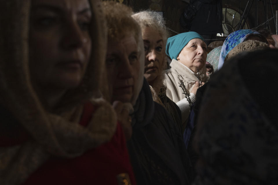 Worshipers gather to celebrate Palm Sunday at Kiev-Pechersk Lavra monastery, Ukraine's most revered Orthodox site in Kyiv, Ukraine, Sunday, April 9, 2023. (AP Photo/Adam Pemble)