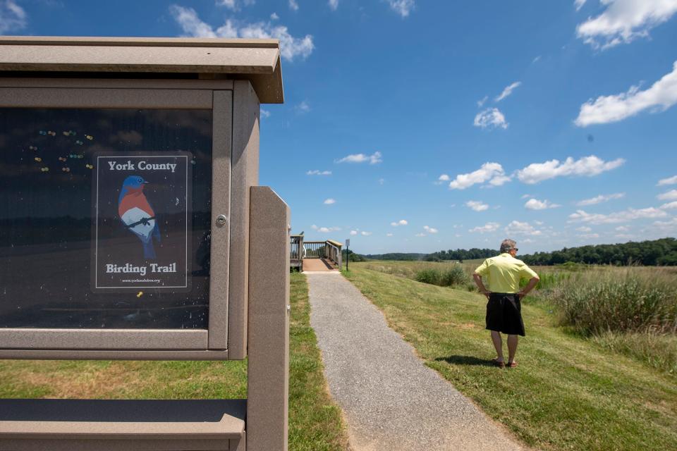 Ken Smith looks out over a field that was once a Superfund site on the property in Hopewell Township on August 8, 2022. Now the site hosts a nature trail. This area is not part of the proposal for expanding the landfill, but is next to it. It was a Superfund site from 1987 until 2005.