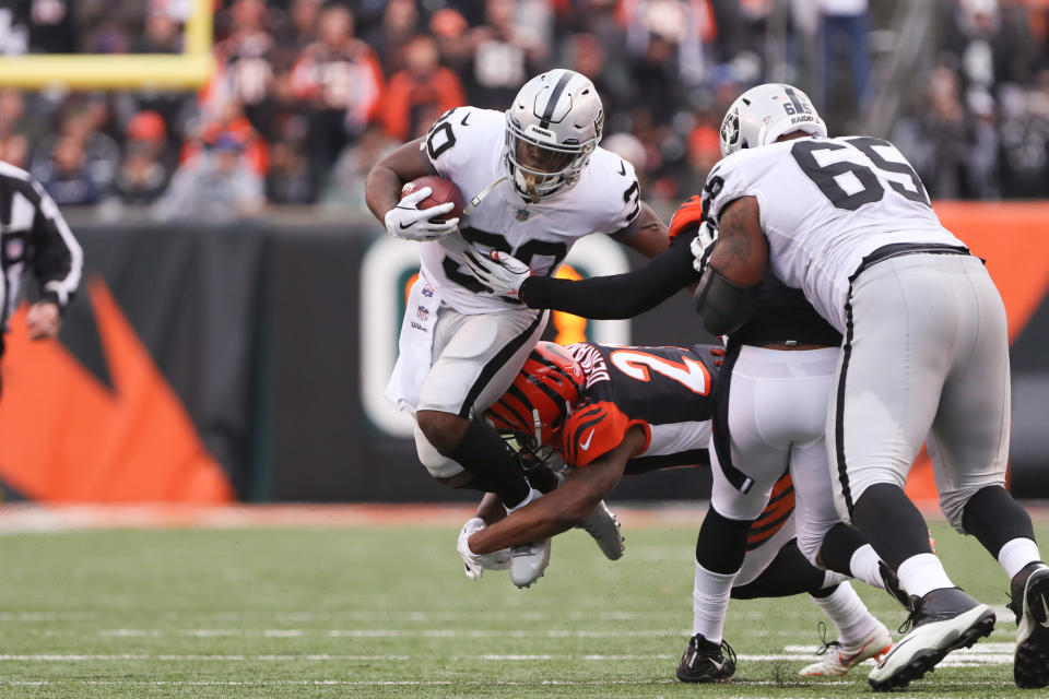 <p>Oakland Raiders running back Jalen Richard (30) carries the ball during the game against the Oakland Raiders and the Cincinnati Bengals on December 16th 2018, at Paul Brown Stadium in Cincinnati, OH. (Photo by Ian Johnson/Icon Sportswire via Getty Images) </p>