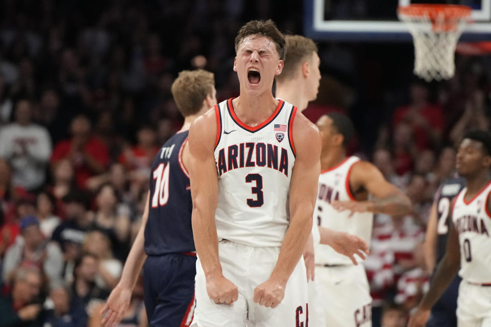 Arizona guard Pelle Larsson (3) reacts after scoring against Belmont during the first half of an NCAA college basketball game, Friday, Nov. 17, 2023, in Tucson, Ariz. (AP Photo/Rick Scuteri)
