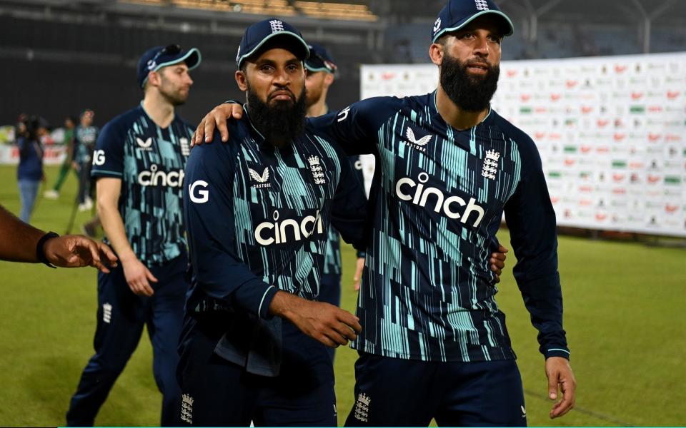 Adil Rashid and Moeen Ali walk off after England's victory in Mirpur - Gareth Copley/Getty Images