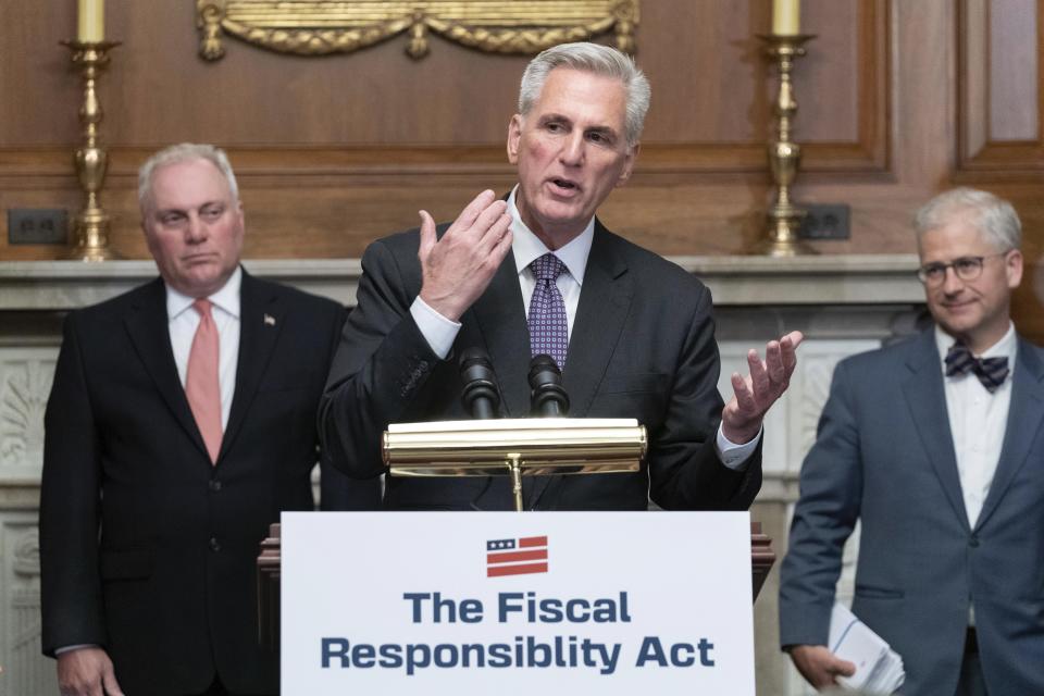 FILE - House Speaker Kevin McCarthy of R-Calif., speaks as House Minority Whip Rep. Steve Scalise, R.La., left, and Rep. Patrick McHenry, R-N.C., listen at a news conference after the House passed the debt ceiling bill at the Capitol in Washington, Wednesday, May 31, 2023. (AP Photo/Jose Luis Magana, File)