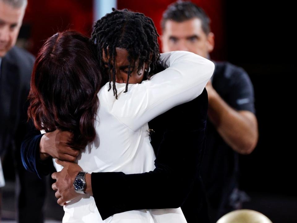 Jaden Ivey hugs his mother, Niele, after being drafted with the fifth overall pick by the Detroit Pistons during the NBA draft on Thursday. (Sarah Stier/Getty Images - image credit)