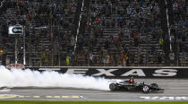 FILE - In this June 8, 2019, file photo, Josef Newgarden celebrates winning an IndyCar auto race at Texas Motor Speedway in Fort Worth, Texas. IndyCar is getting ready for an all-in-one-day season opener on the fast track in Texas, more than 2 ½ months after drivers were set to roll on the streets of St. Pete. The pandemic-delayed season is now set to open Saturday, June 6, 2020. (AP Photo/Randy Holt, File)
