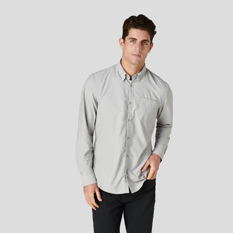 Model wearing a lightweight performance dress shirt.