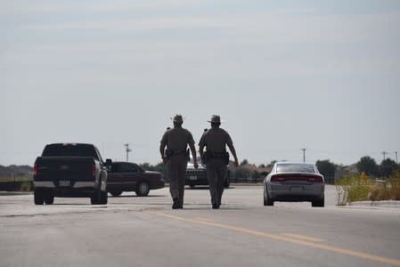 State troopers and other emergency personnel are seen following a shooting in Odessa