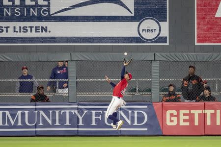 Apr 26, 2019; Minneapolis, MN, USA; Minnesota Twins center fielder Byron Buxton (25) jumps up and catches a fly ball in the fifth inning against the Baltimore Orioles at Target Field. Mandatory Credit: Jesse Johnson-USA TODAY Sports